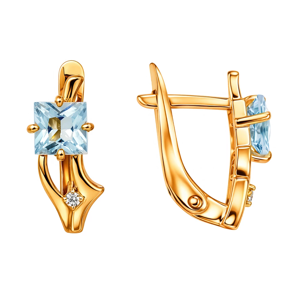 Серьги с топазами и фианитами из красного золота 585 пробы