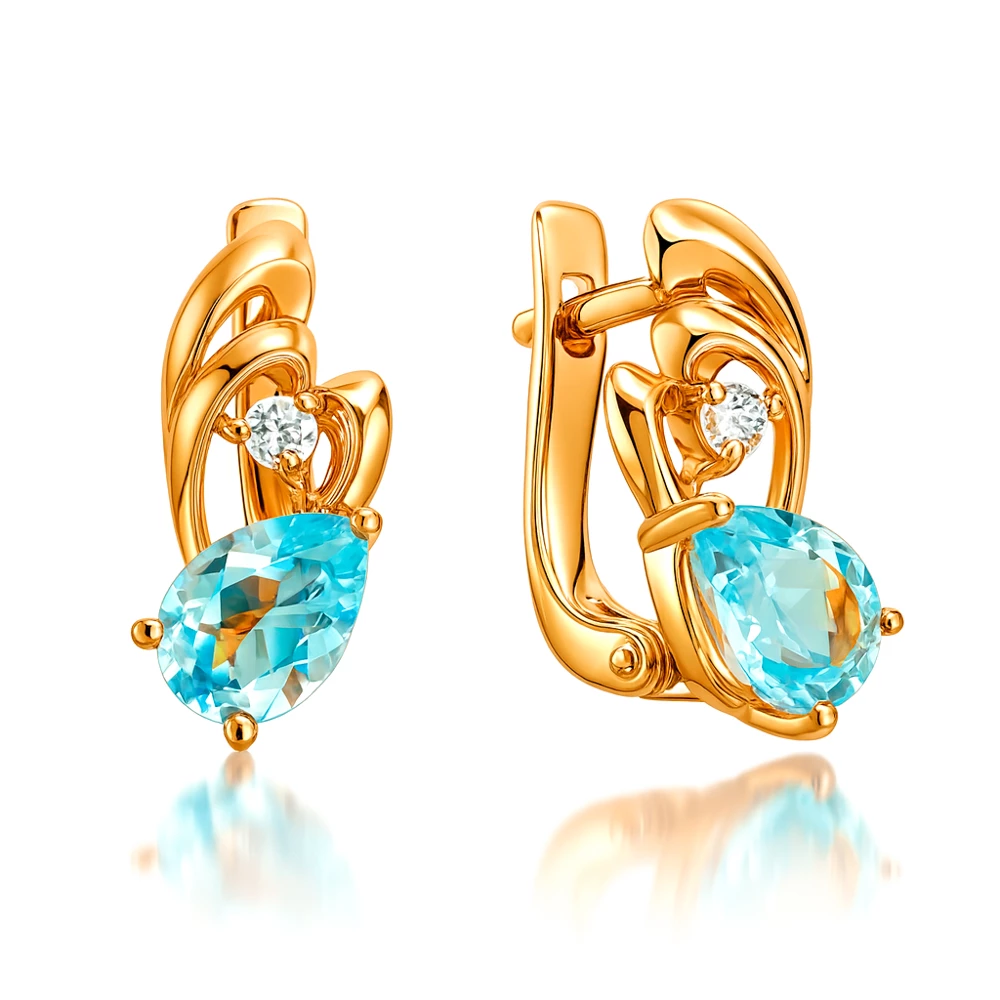 Серьги с топазами и фианитами из красного золота 585 пробы