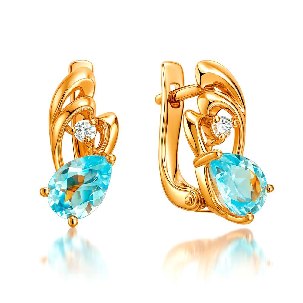 Серьги с топазами и фианитами из красного золота 585 пробы