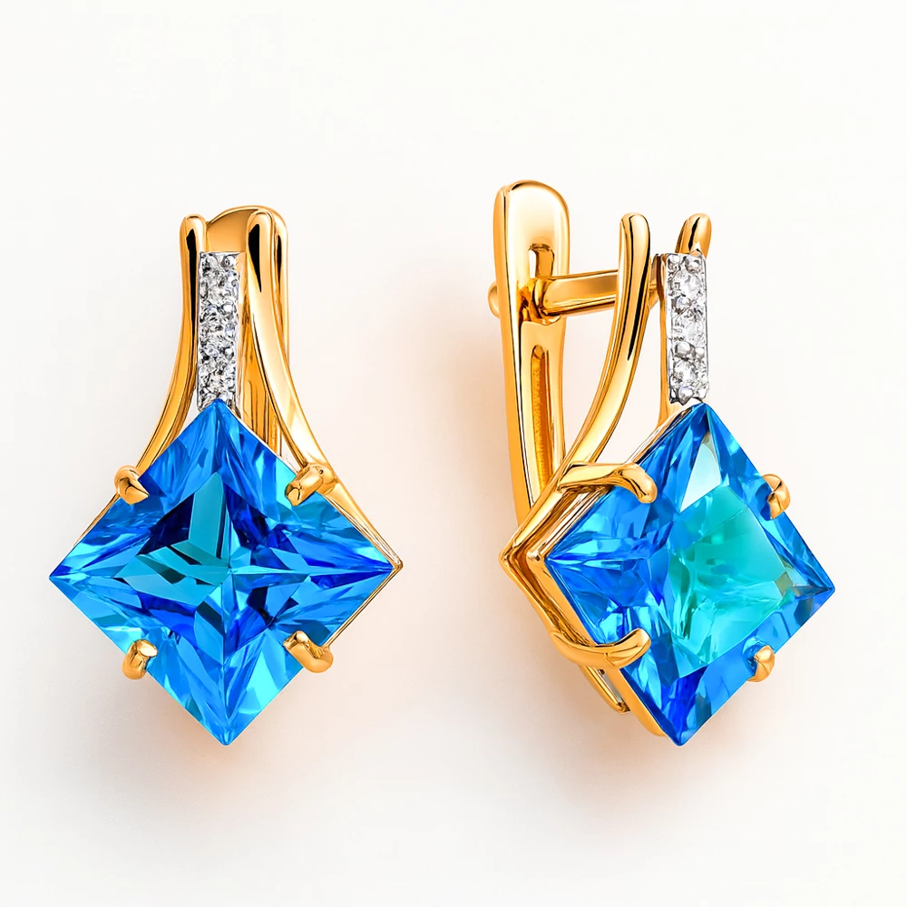 Серьги с топазами и фианитами из красного золота 585 пробы