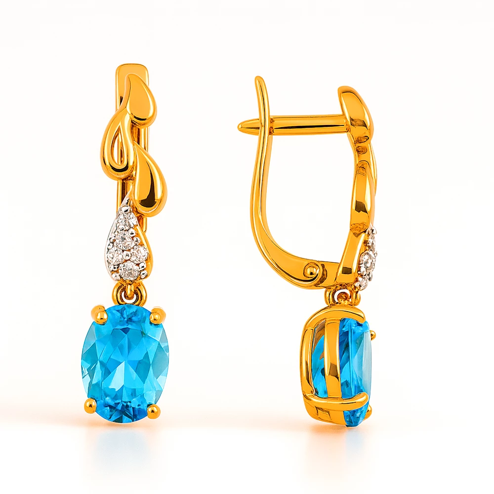 Серьги с топазами и фианитами из красного золота 585 пробы