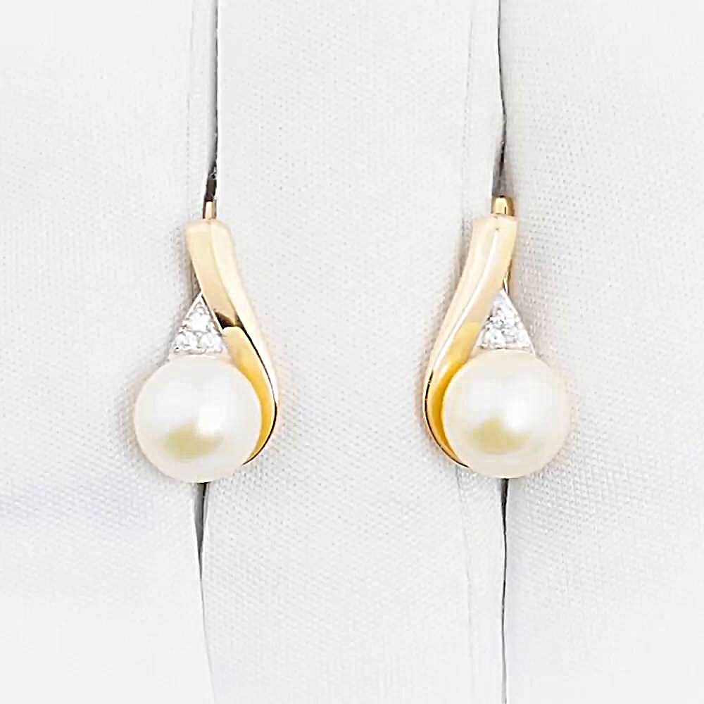 Серьги с культивированным жемчугом и фианитами из красного золота 585 пробы