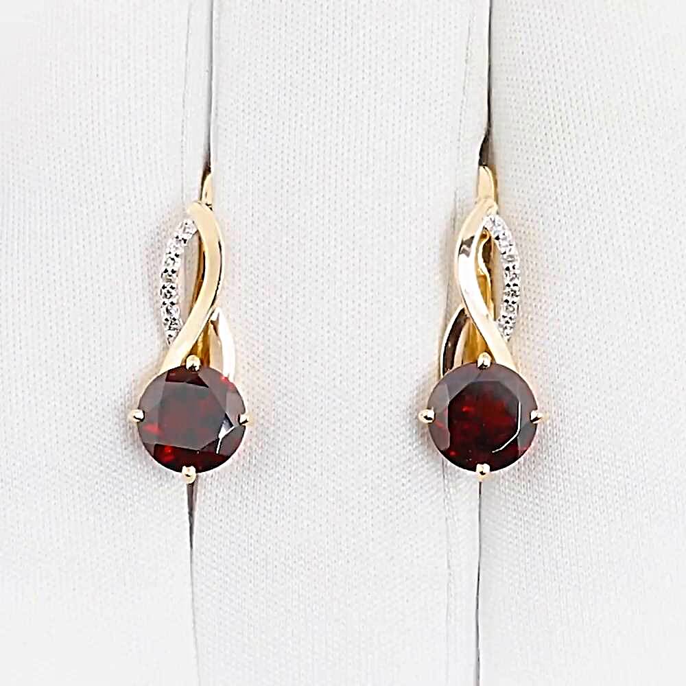 Серьги с гранатами и бриллиантами из красного золота 585 пробы