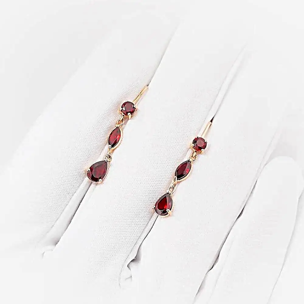 Серьги с гранатами из красного золота 585 пробы 1