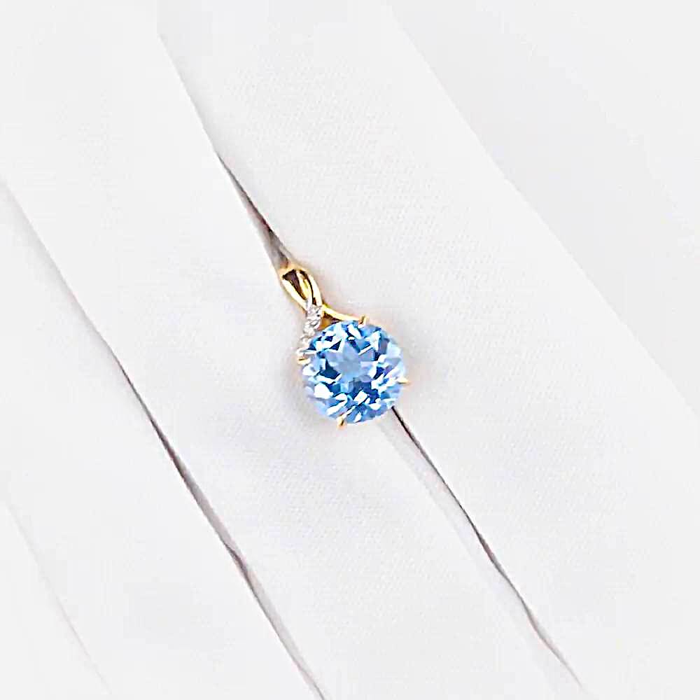 Подвес с топазами и фианитами из красного золота 375 пробы 1