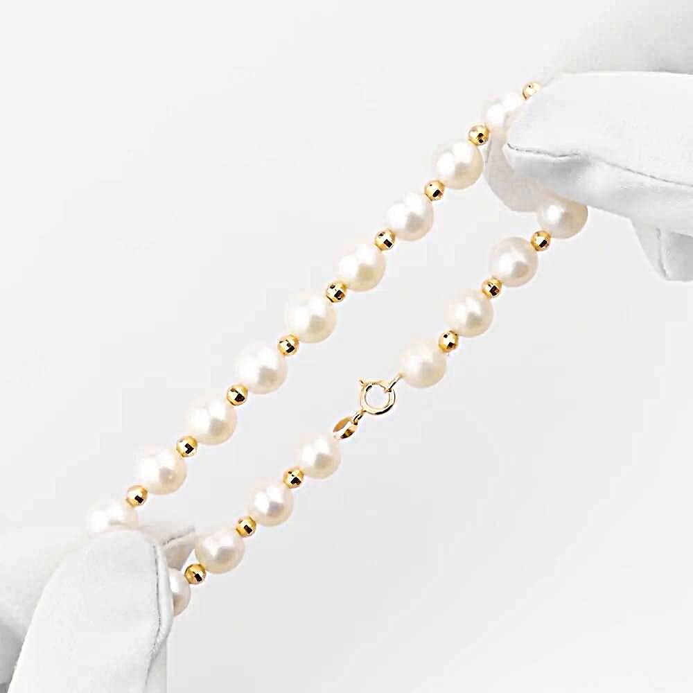 Браслет с культивированным жемчугом из красного золота 585 пробы 1