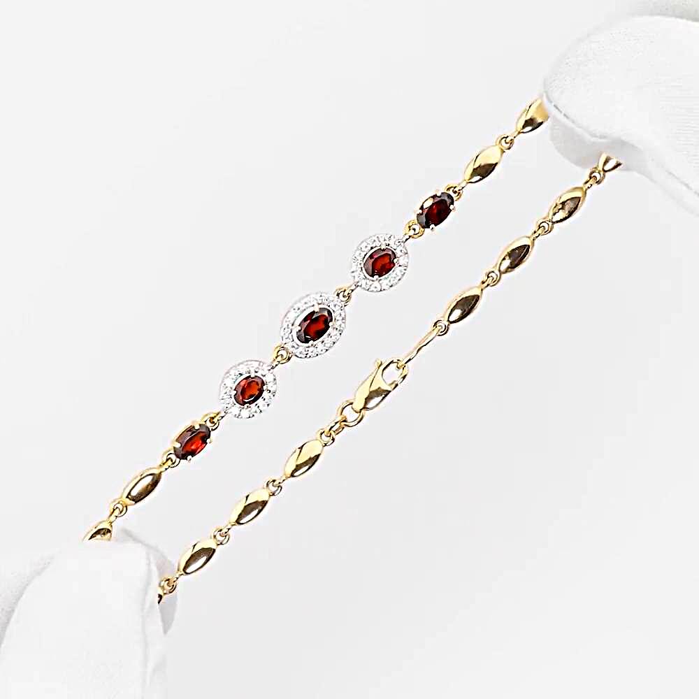 Браслет с гранатами и фианитами из красного золота 585 пробы 1