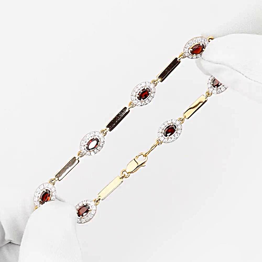 Браслет с гранатами и фианитами из красного золота 585 пробы 1