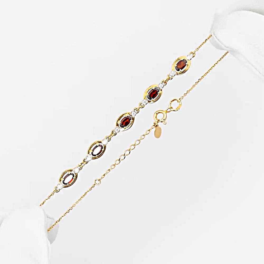 Браслет с гранатами и фианитами из красного золота 585 пробы 1