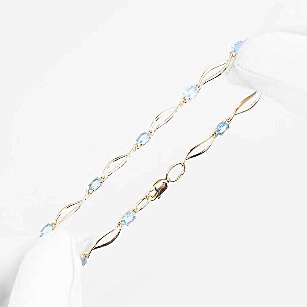 Браслет с топазами из красного золота 585 пробы