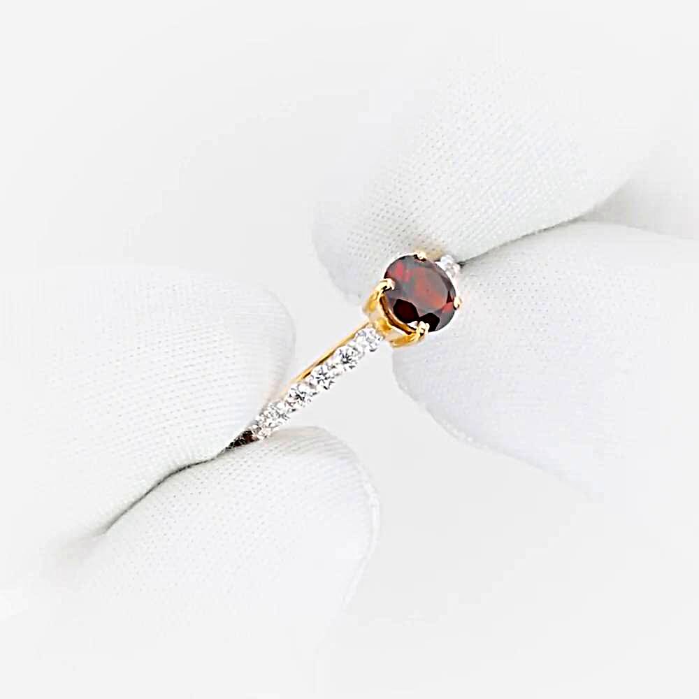 Кольцо с гранатами и фианитами из красного золота 585 пробы