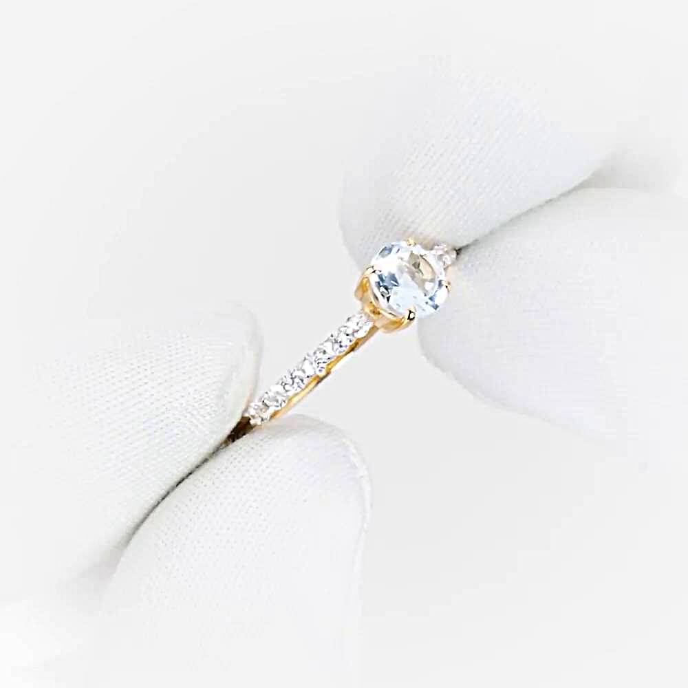 Кольцо с топазами и фианитами из красного золота 375 пробы