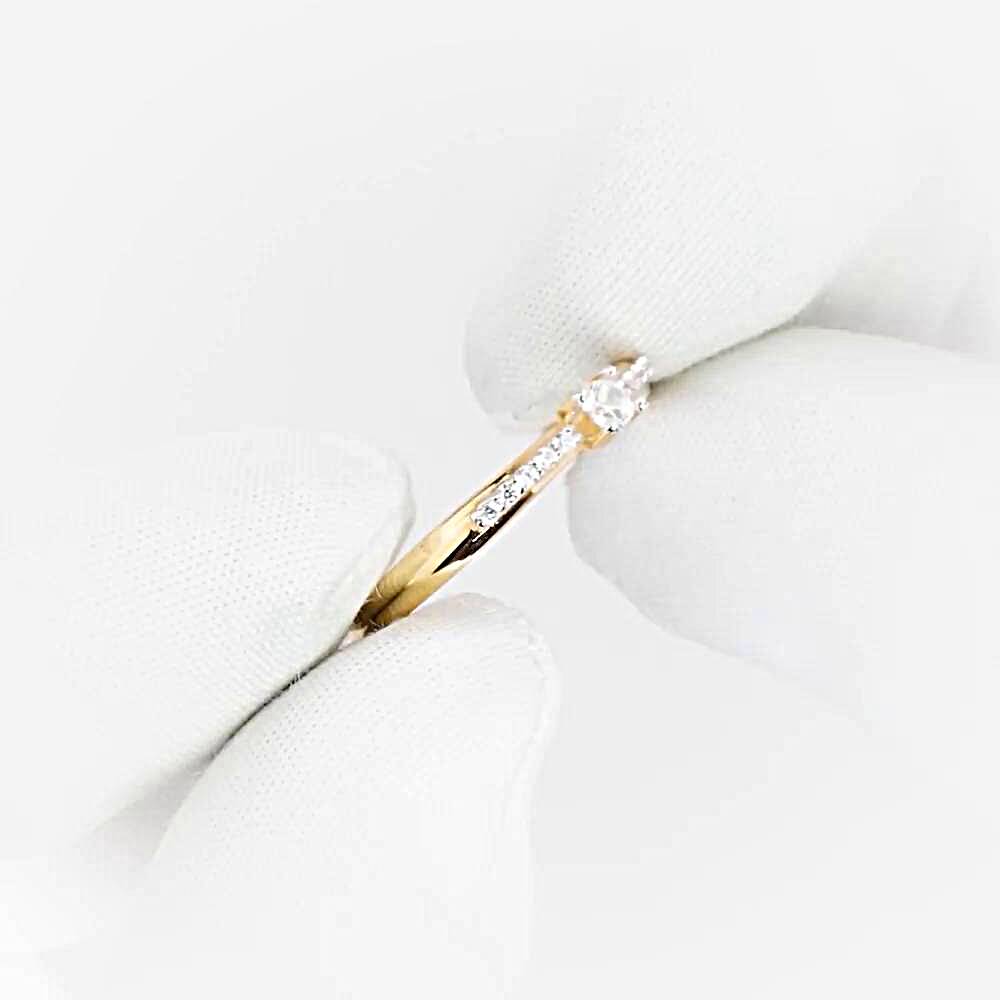 Кольцо с фианитами из красного золота 585 пробы