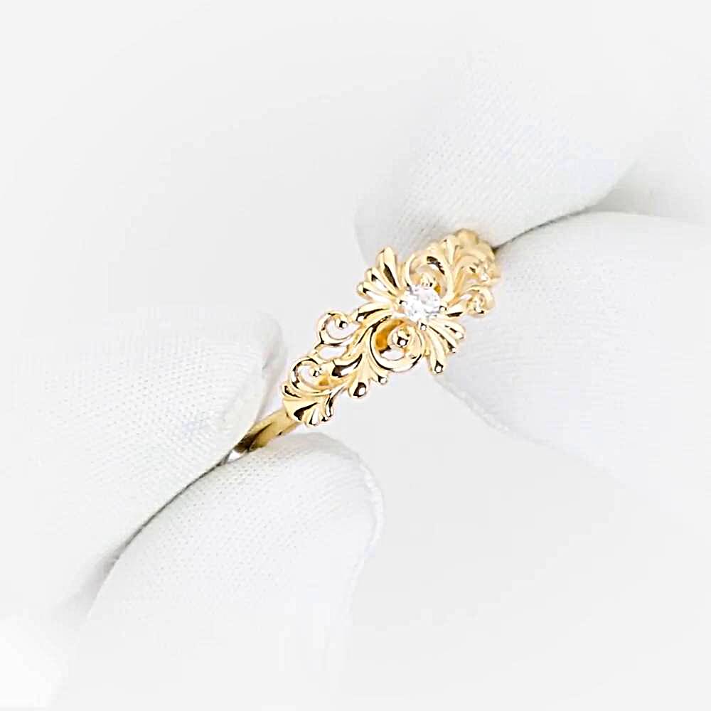 Кольцо с фианитом из красного золота 585 пробы