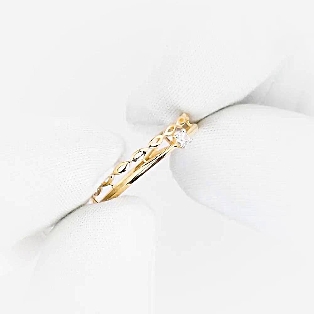 Кольцо с фианитом из красного золота 585 пробы