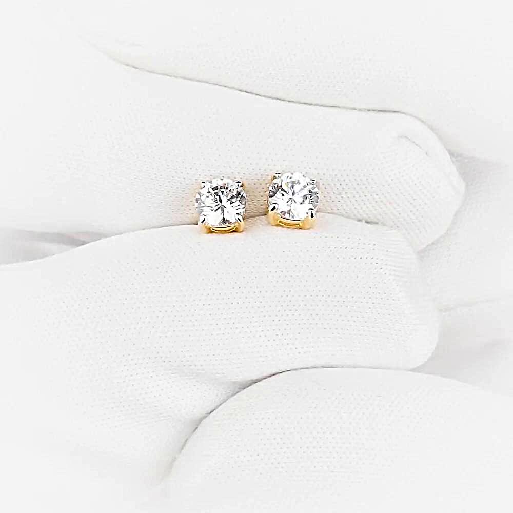 Серьги с фианитами из красного золота 585 пробы