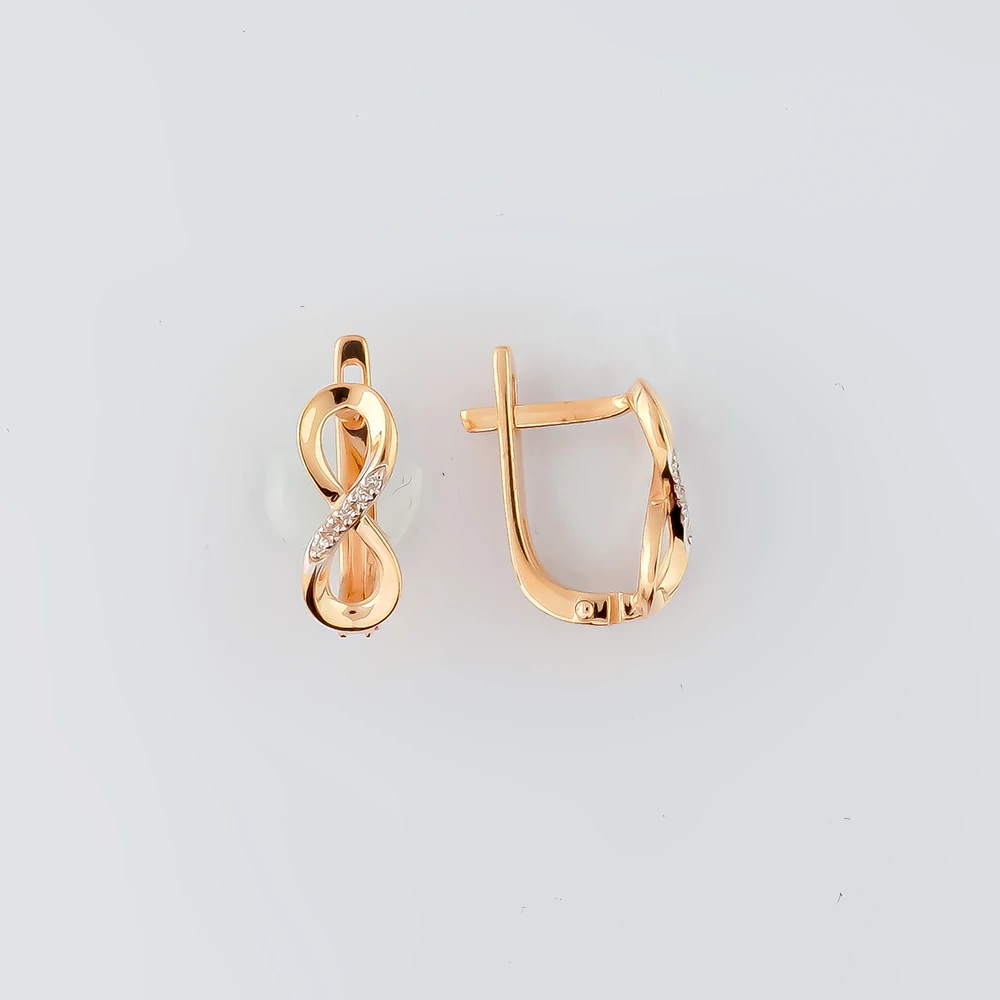 Серьги с бриллиантом из красного золота 585 пробы