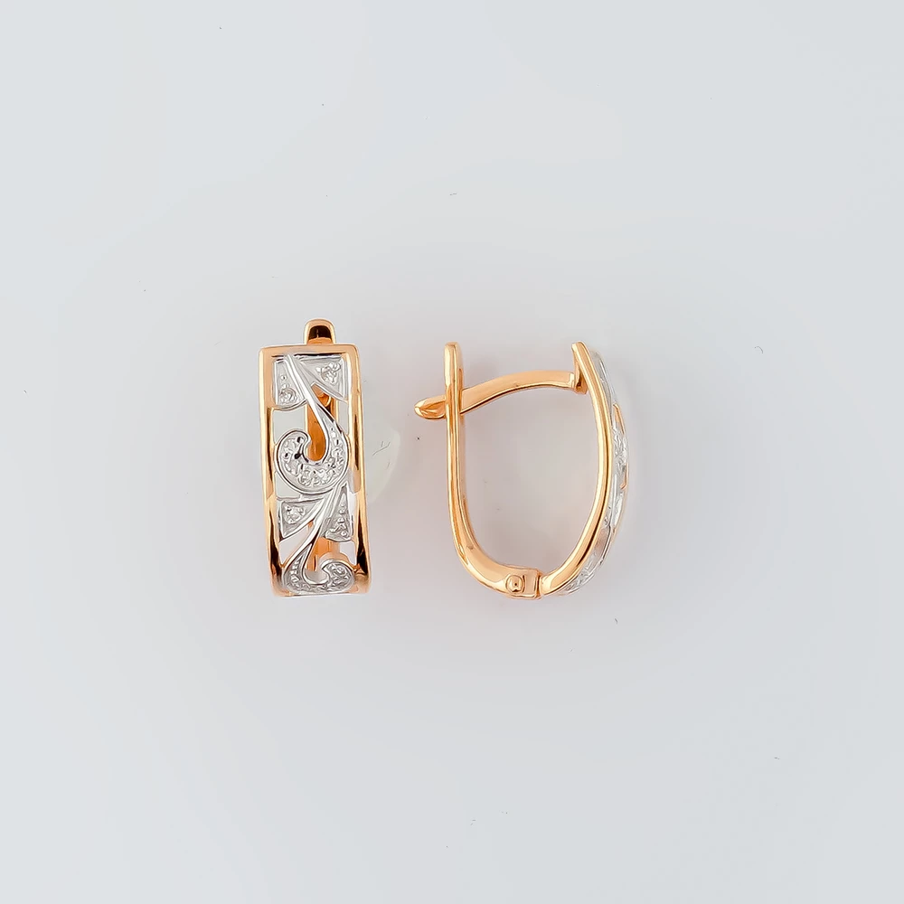 Серьги с бриллиантом из красного золота 585 пробы