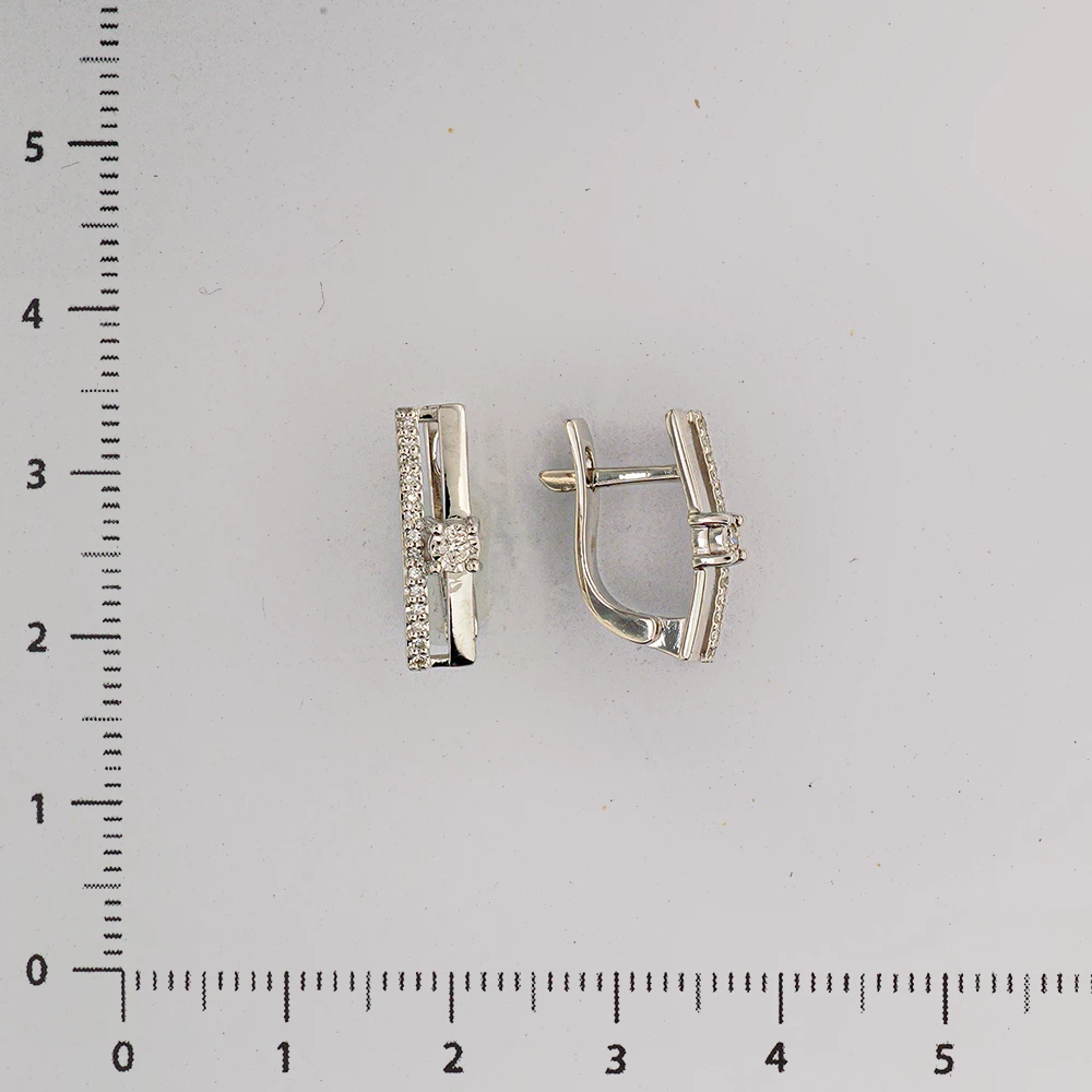 Серьги с бриллиантом из белого золота 585 пробы