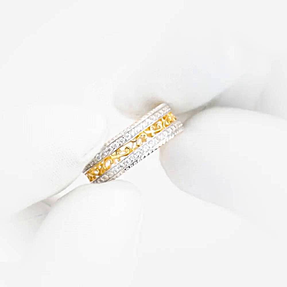 Кольцо обручальное с фианитами из комбинированного золота 585 пробы 1