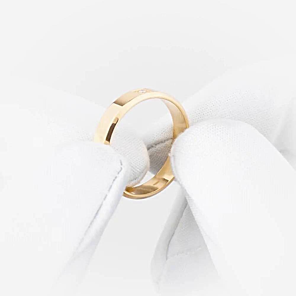 Кольцо обручальное с бриллиантом из красного золота 585 пробы