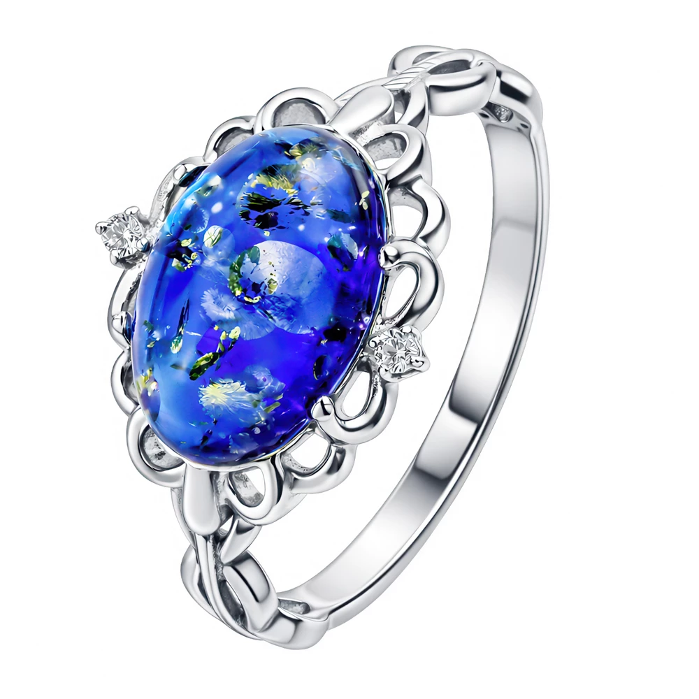 Кольцо с янтарем и фианитами из серебра 925 пробы