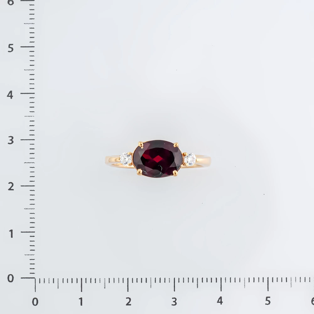 Кольцо с гранатом из красного золота 585 пробы Кольцо с гранатом из красного золота 585 пробы