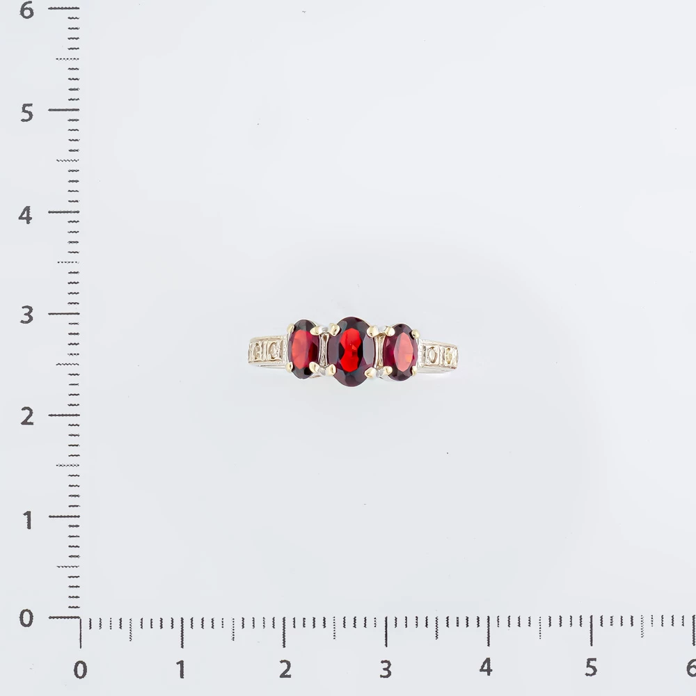 Кольцо с гранатом из белого золота 585 пробы