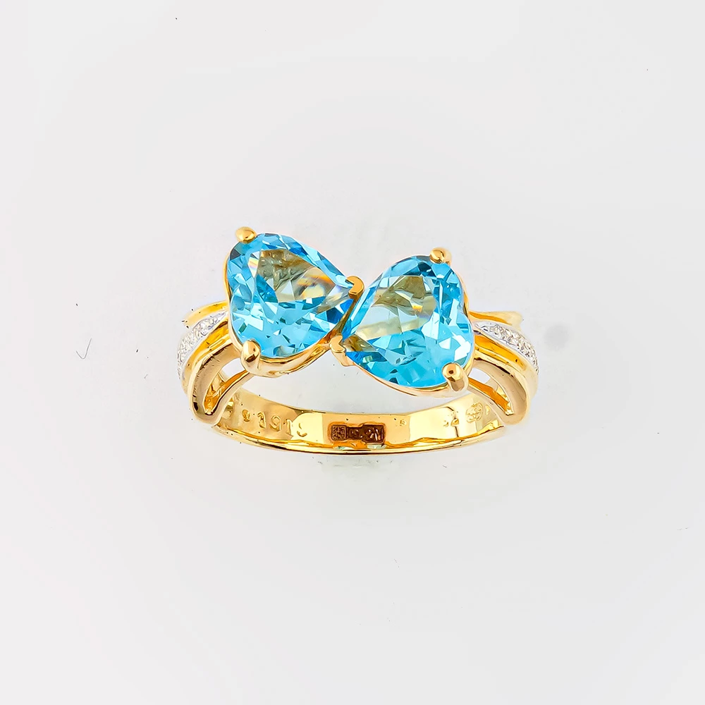 Кольцо с топазом из желтого золота 750 пробы