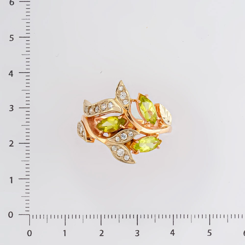 Кольцо с хризолитом из красного золота 585 пробы Кольцо с хризолитом из красного золота 585 пробы