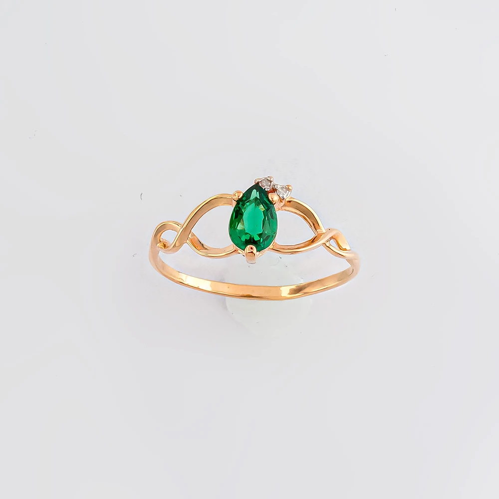 Кольцо с изумрудом синтетическим из красного золота 585 пробы Кольцо с изумрудом синтетическим из красного золота 585 пробы