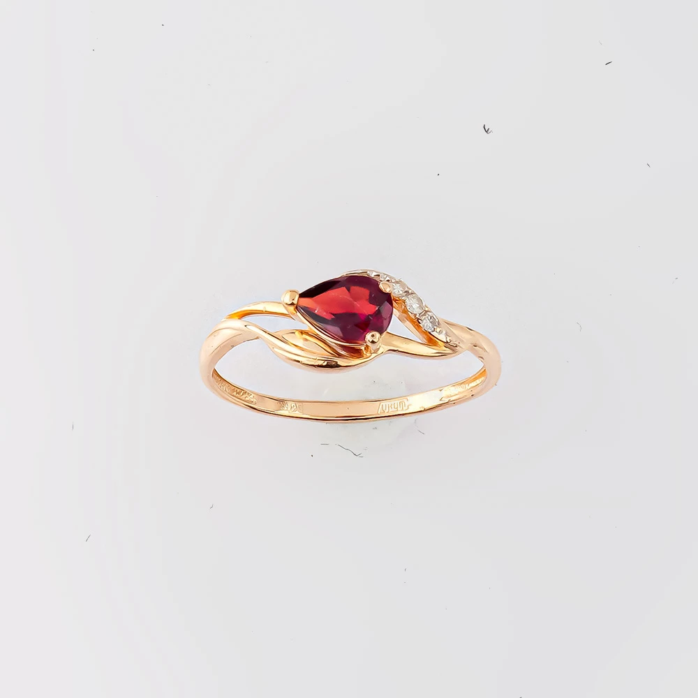 Кольцо с гранатом из красного золота 585 пробы