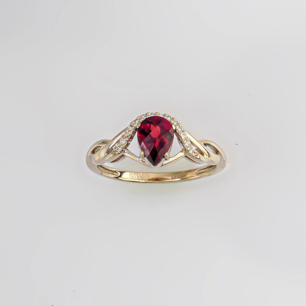 Кольцо с гранатом из белого золота 585 пробы