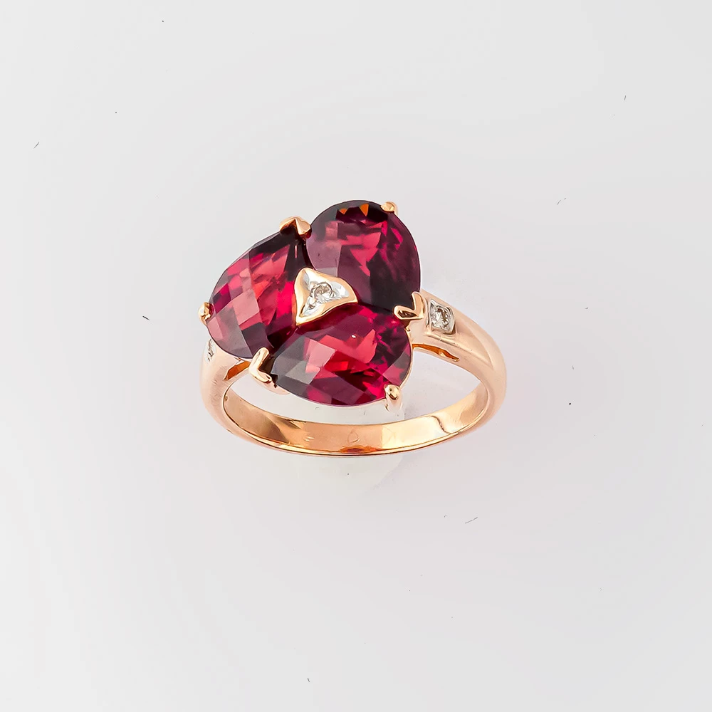 Кольцо с гранатом из красного золота 500 пробы Кольцо с гранатом из красного золота 500 пробы