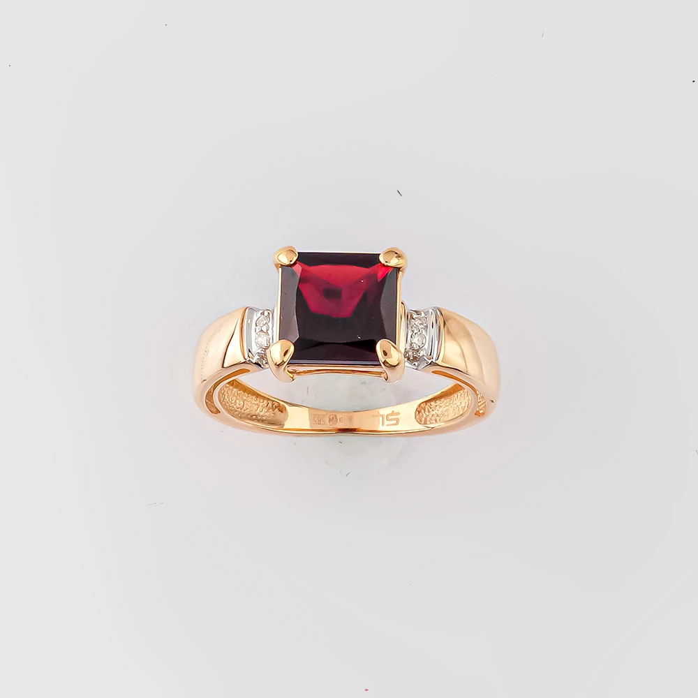 Кольцо с гранатом из красного золота 585 пробы