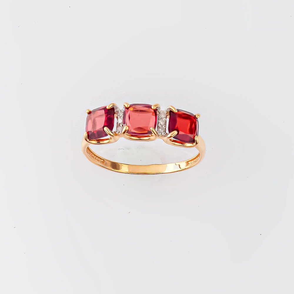 Кольцо с гранатом из красного золота 585 пробы