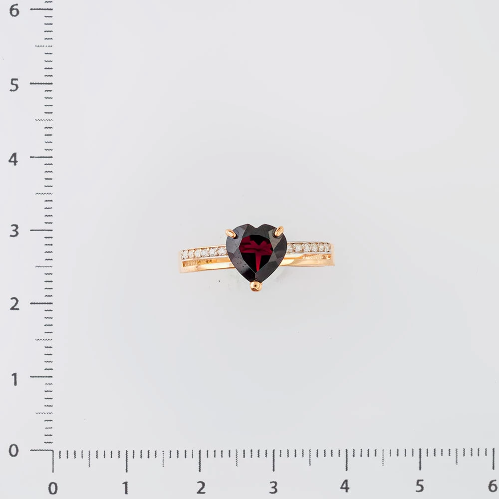 Кольцо с гранатом из красного золота 585 пробы