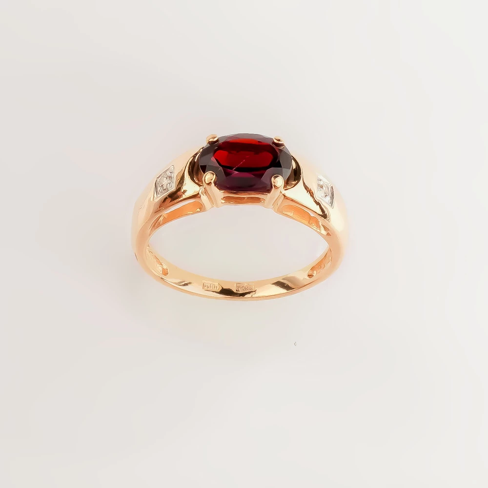 Кольцо с гранатом из красного золота 585 пробы