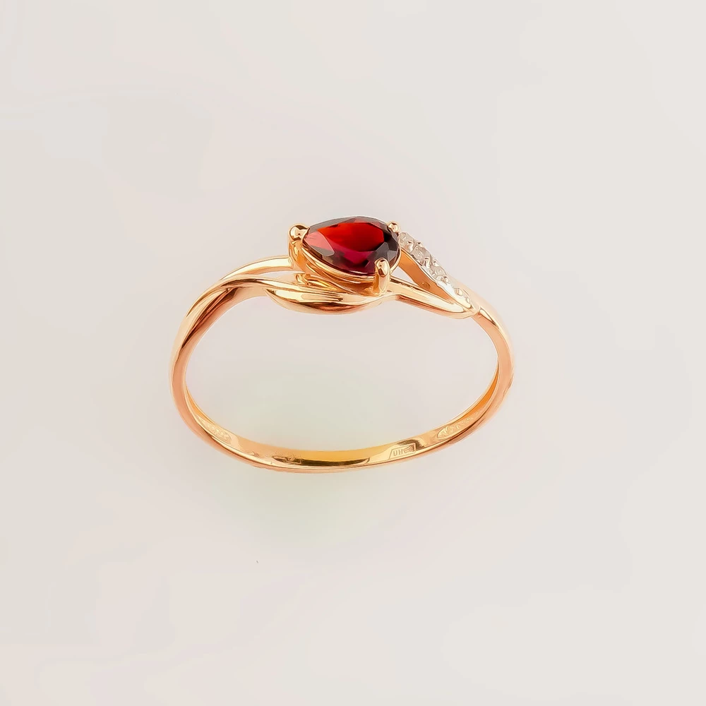 Кольцо с гранатом из красного золота 585 пробы