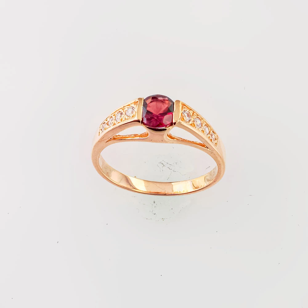 Кольцо с гранатом из красного золота 585 пробы