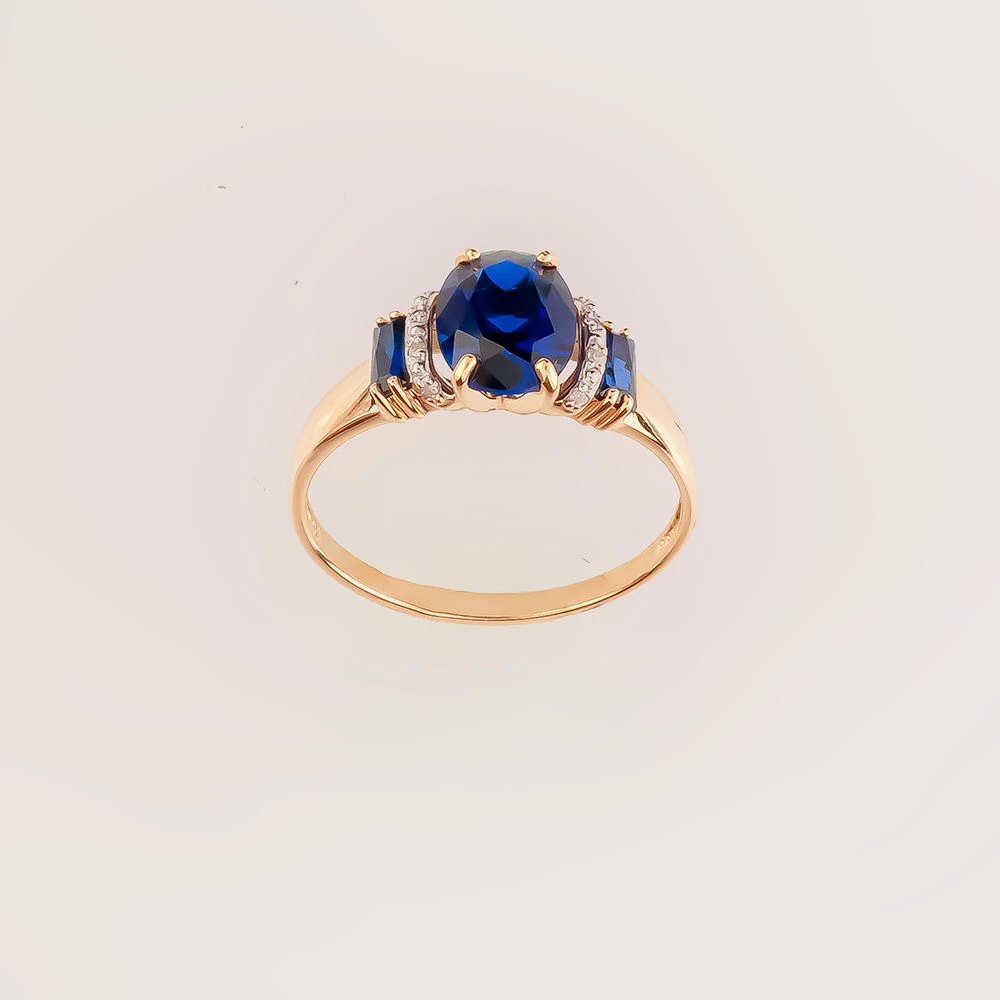 Кольцо с сапфиром синтетическим из красного золота 585 пробы