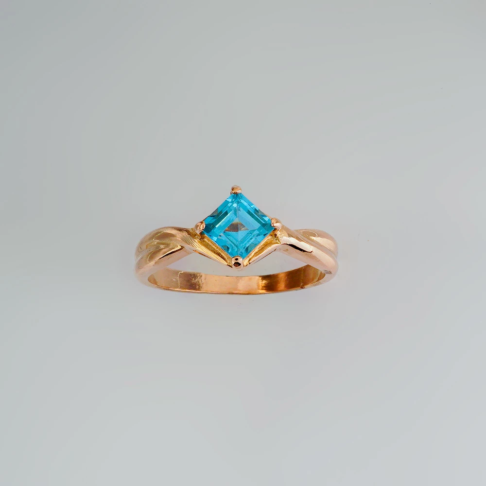 Кольцо с топазом из красного золота 585 пробы
