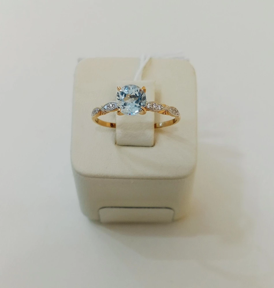 Кольцо с топазом из красного золота 585 пробы