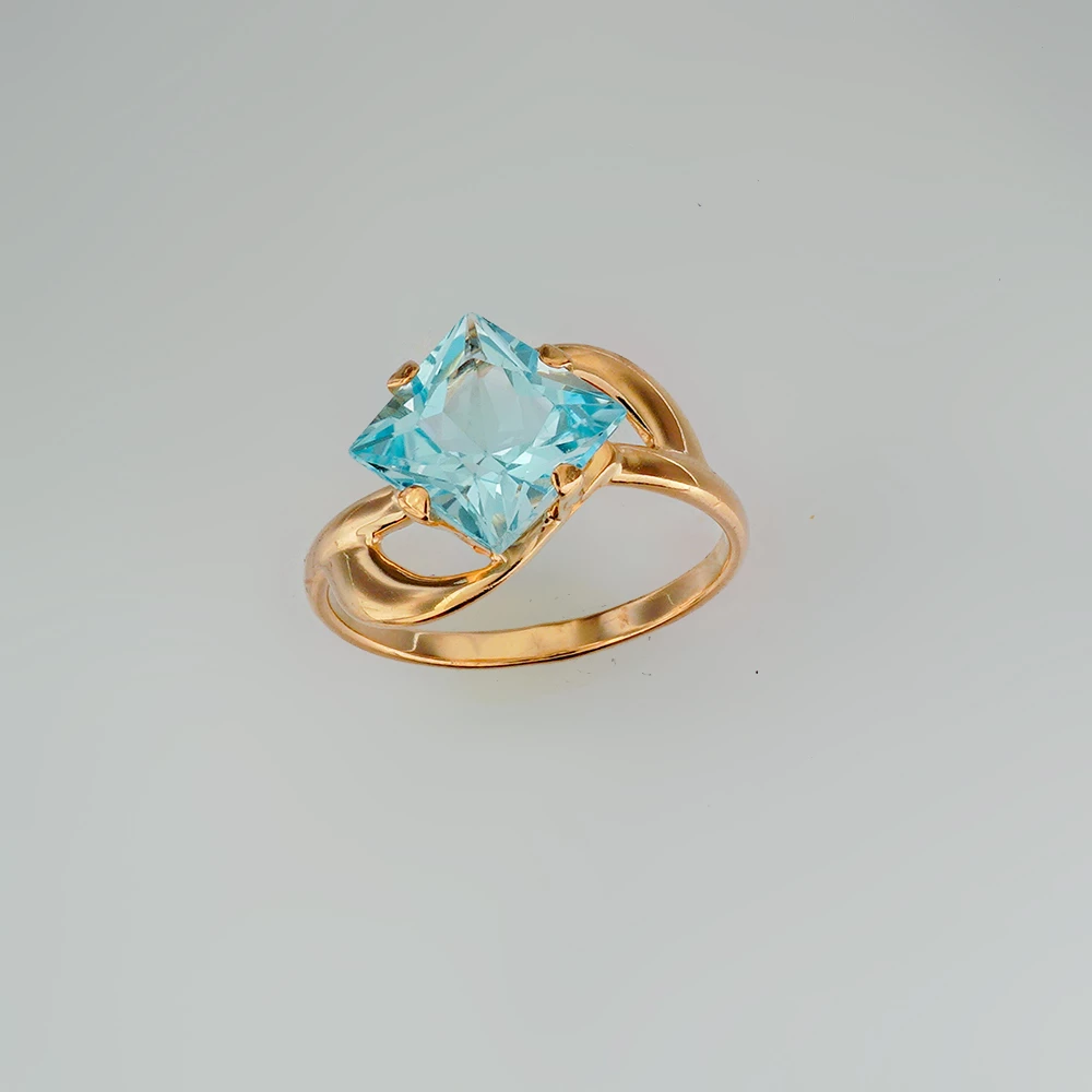 Кольцо с топазом из красного золота 585 пробы