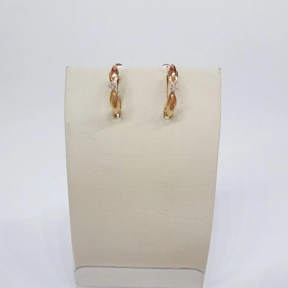 Серьги с бриллиантом из красного золота 585 пробы 1