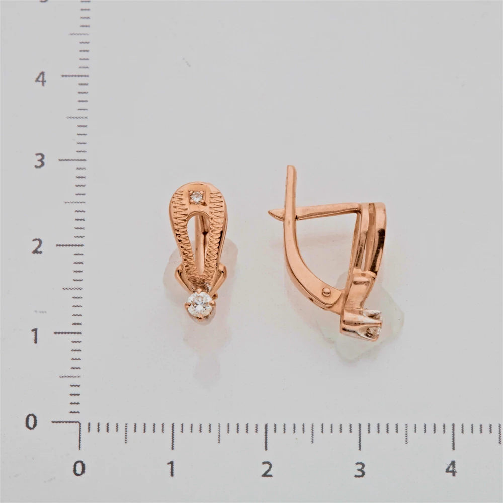 Серьги с бриллиантом из красного золота 585 пробы