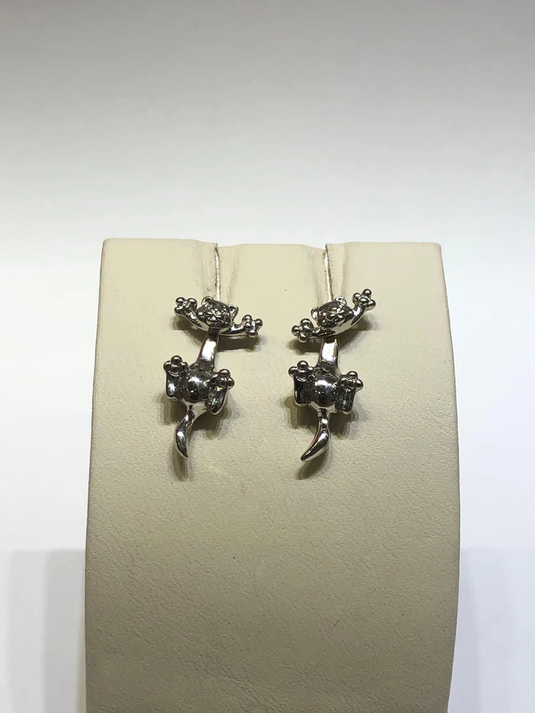 Серьги с бриллиантом из белого золота 750 пробы 1