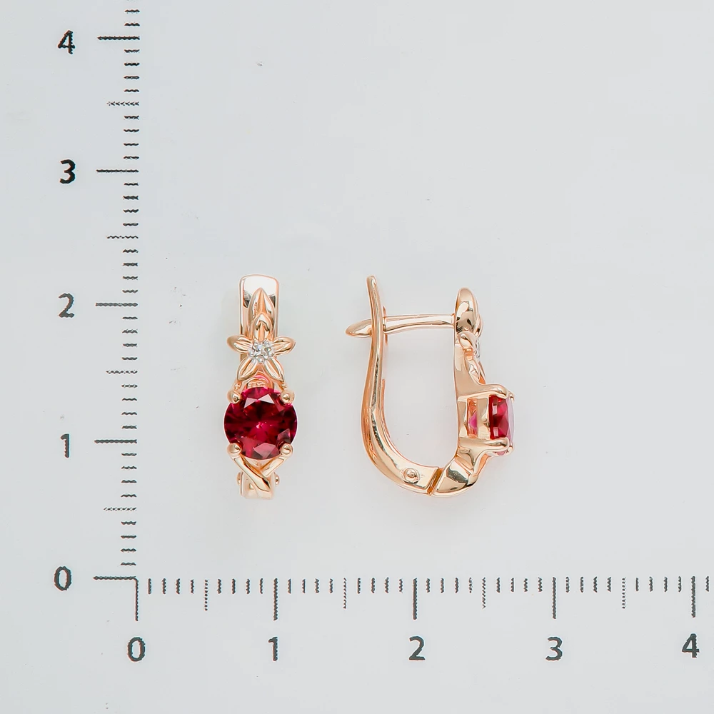 Серьги с бриллиантом из красного золота 585 пробы