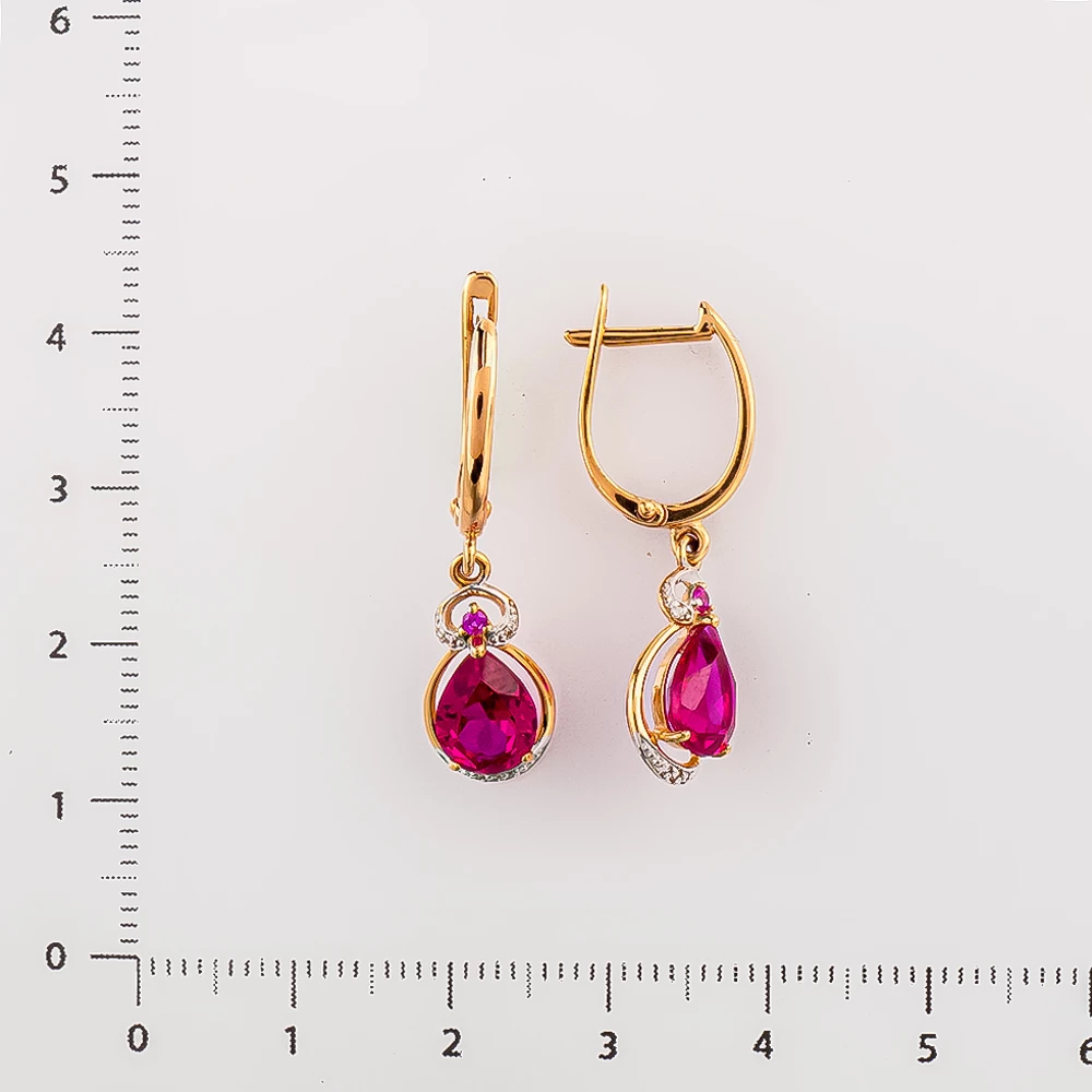 Серьги с бриллиантом из красного золота 585 пробы