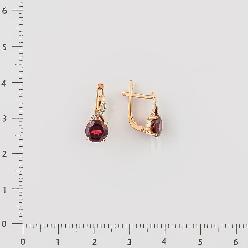 Серьги с бриллиантом из красного золота 585 пробы